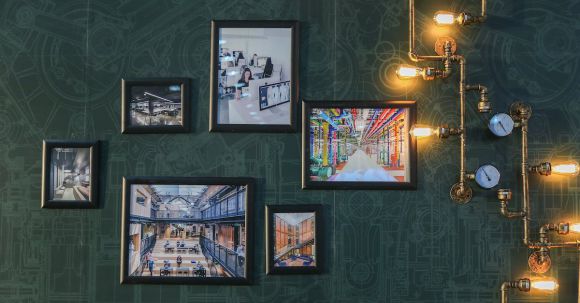 Wall Art - Assorted Paintings on Green Wall