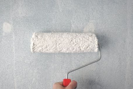 Wall Painting - Person Holding Paint Roller On Wall