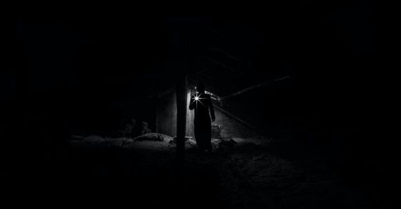 Backyard Landscape - Low Angle View of Man Standing at Night