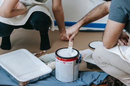 Room Makeovers - Man Mixing Paint In A Can