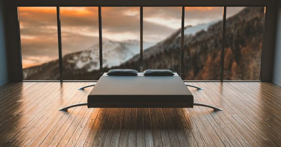 Smart Home - Black Mattress in Front of a Large Window Behind a Mountain