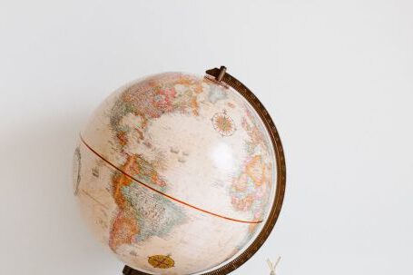 Storage Solutions - Retro toys and globe on cabinet in nursery room