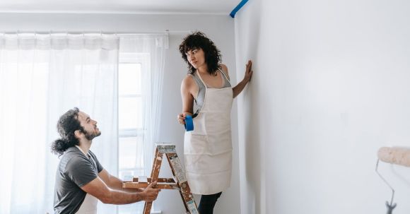 Room Makeovers - Couple Painting The Wall
