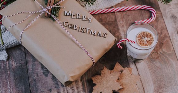 Seasonal Decor - Glass of Milk Near Christmas Present