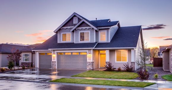 Smart Home - Blue and Gray Concrete House With Attic during Twilight