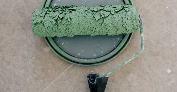 Home Repair - Roller for paint on floor at home